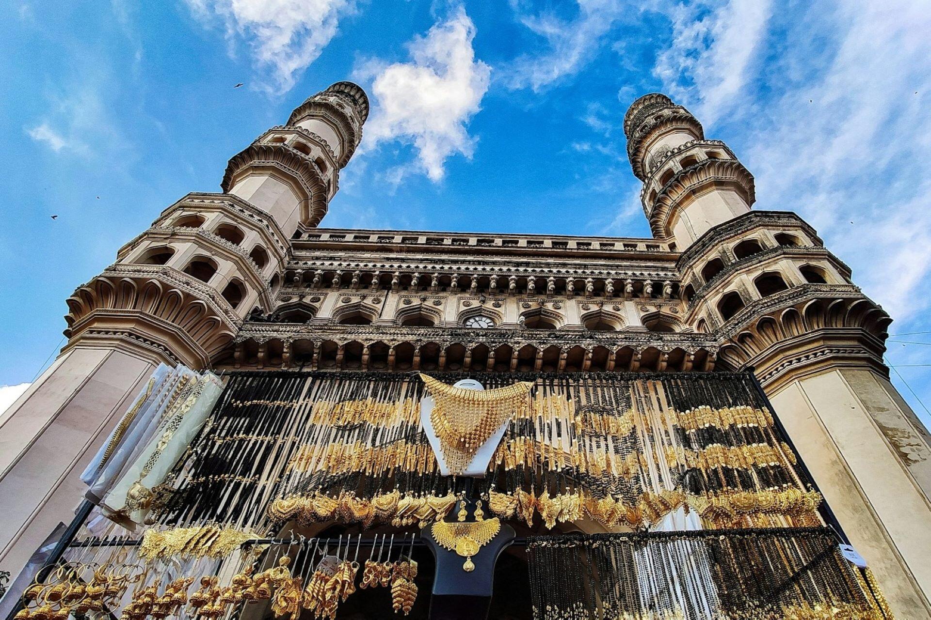 Charminar viewed from below with rows of jewellery hanging in the foreground