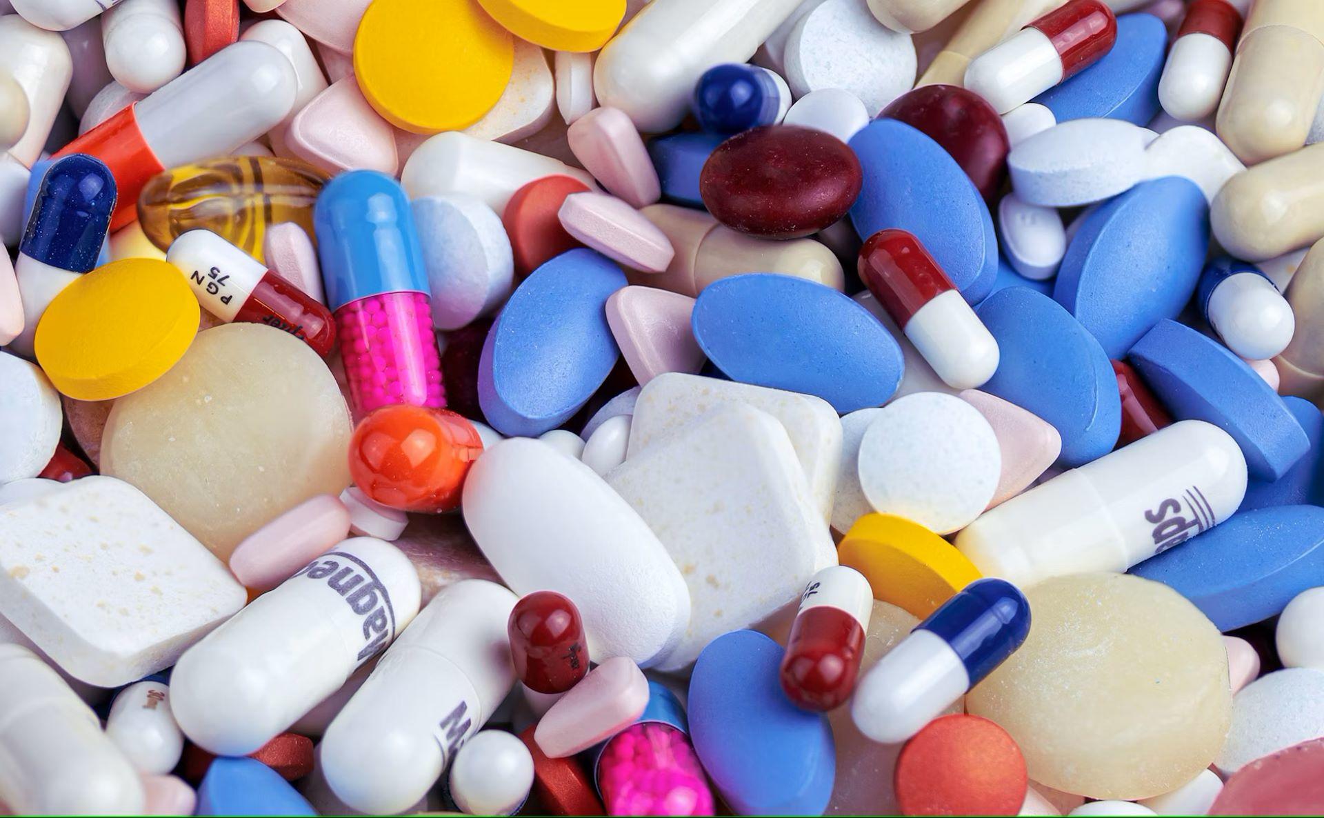 A colorful pile of pills and tablets