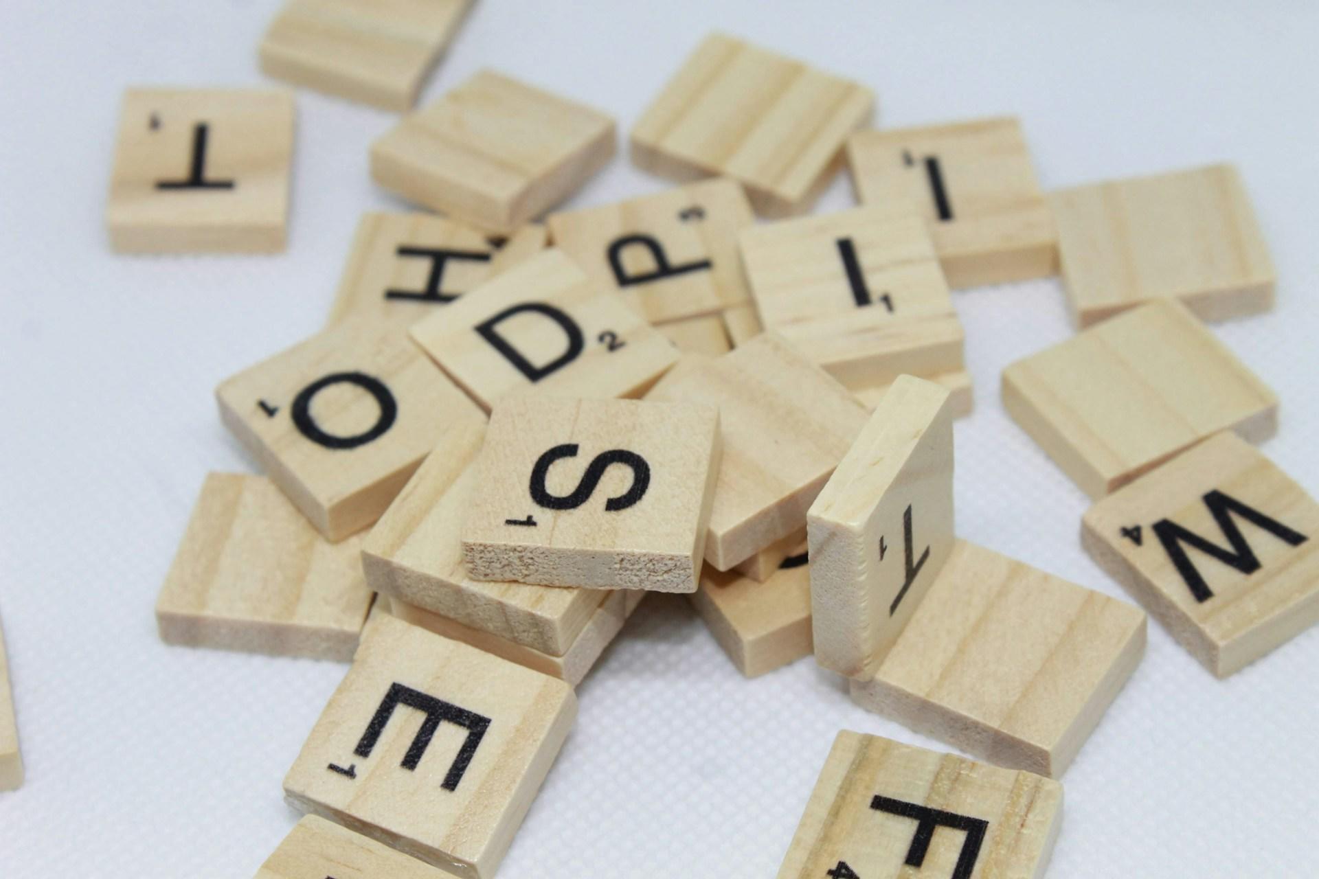 A closeup of wooden Scrabble tiles.