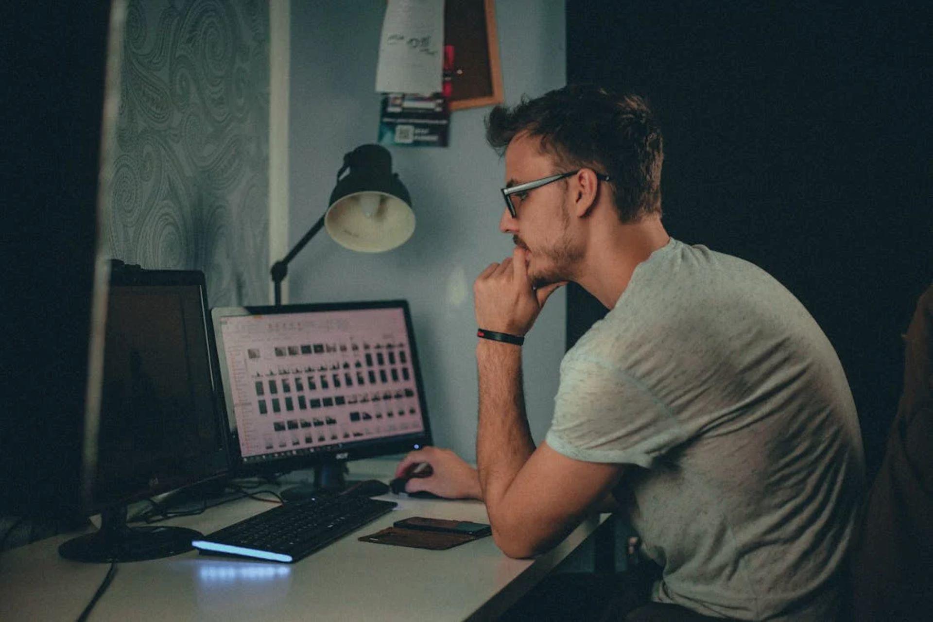 Man using a computer to create graphic designs