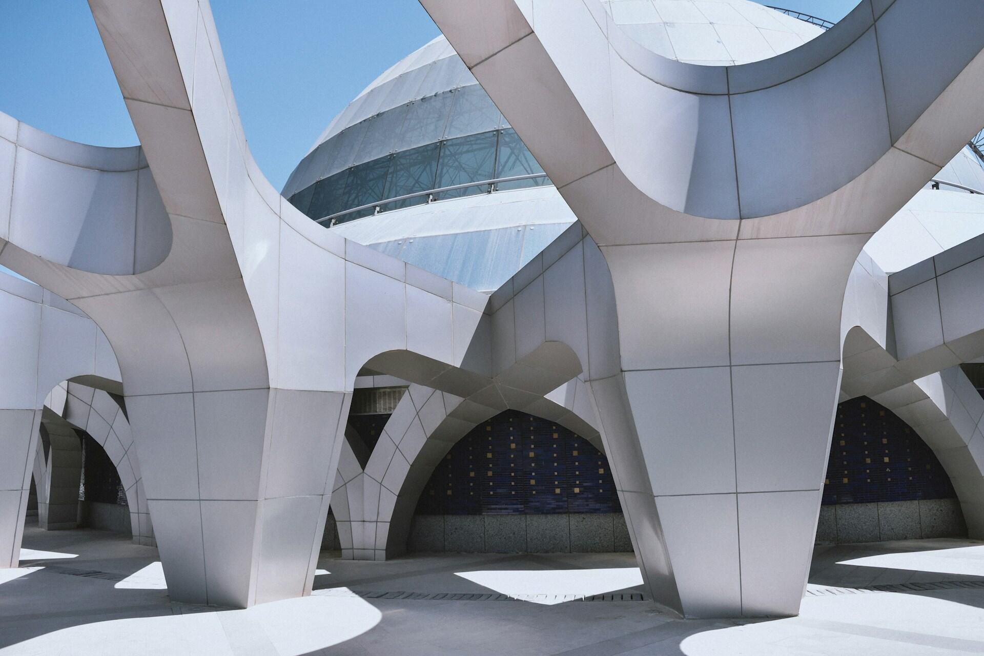 grey concrete building under a blue sky