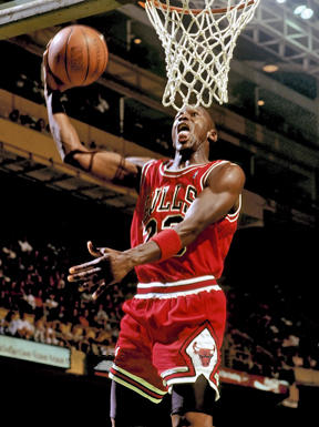 Michael Jordan jumping to score.