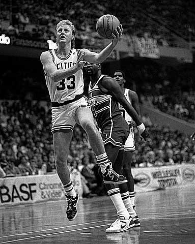 Larry Bird doing a lay up.