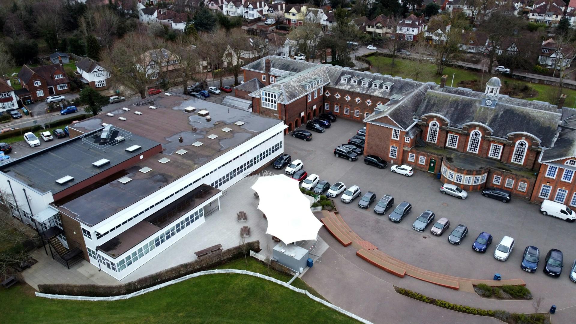 overhead shot of a grammar school in the united kingdom including building and outdoor grounds