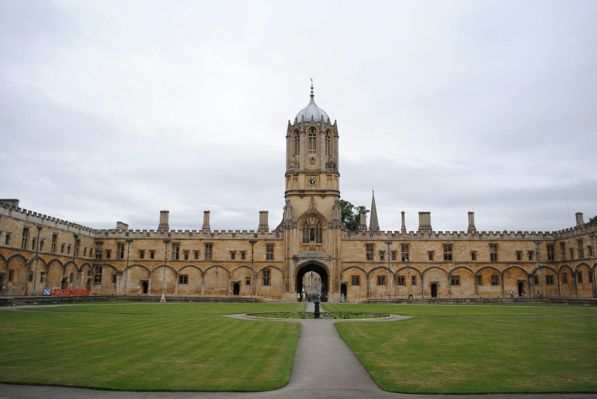 Oxford University with its expansive green space on a cloudy day.