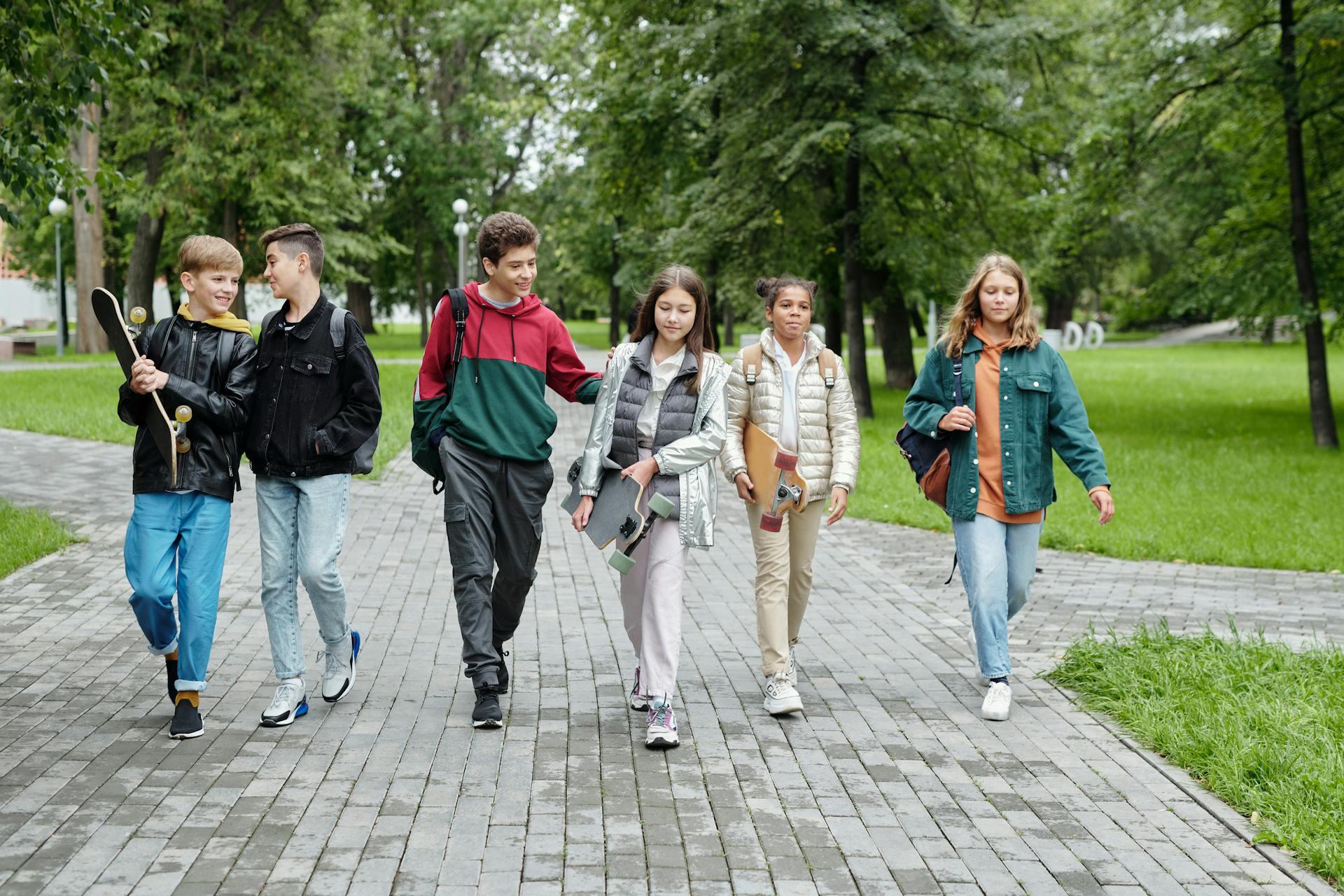 A group of young students walking together.