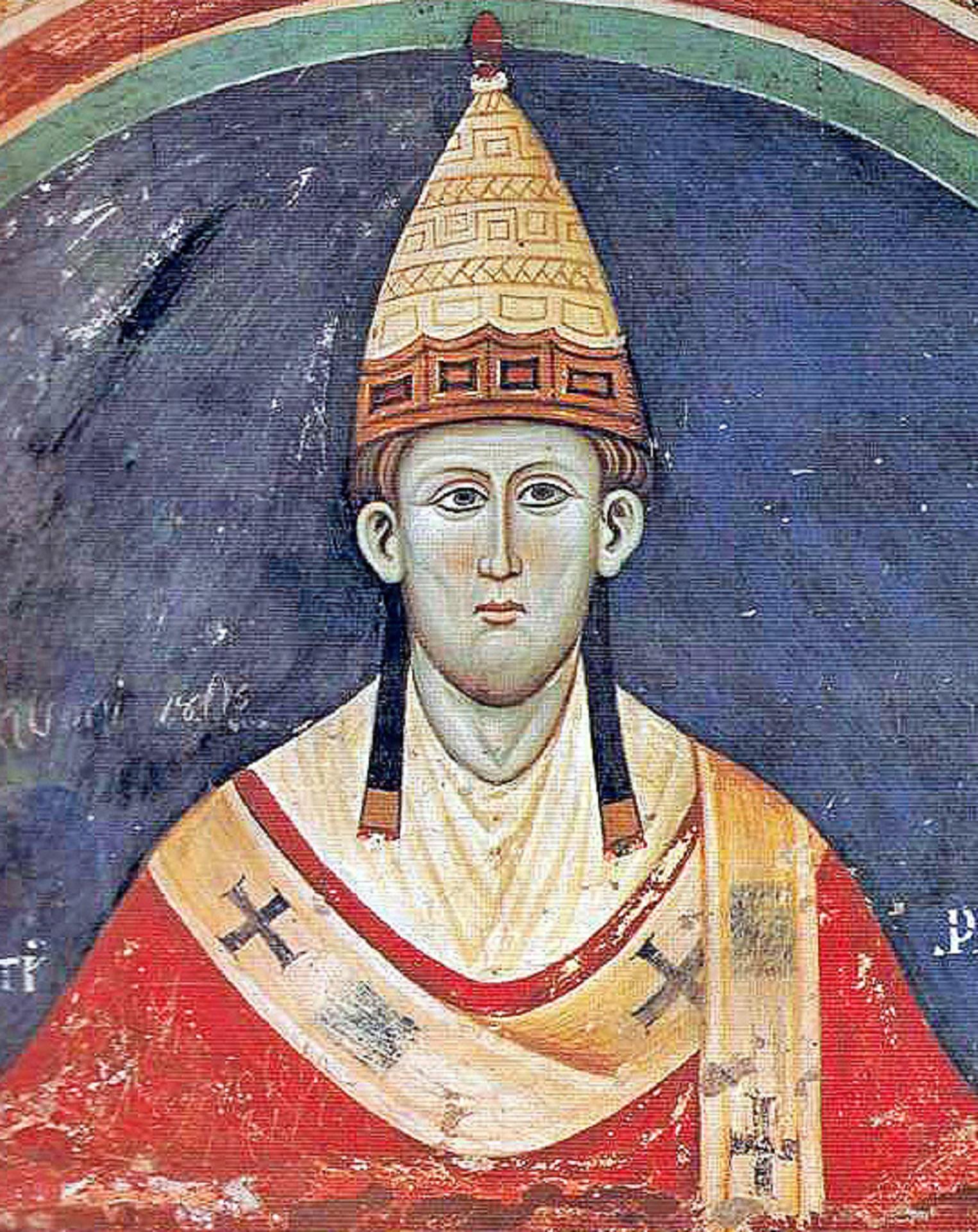 A medieval painting of a man wearing a red robe and a pointy hat. 
