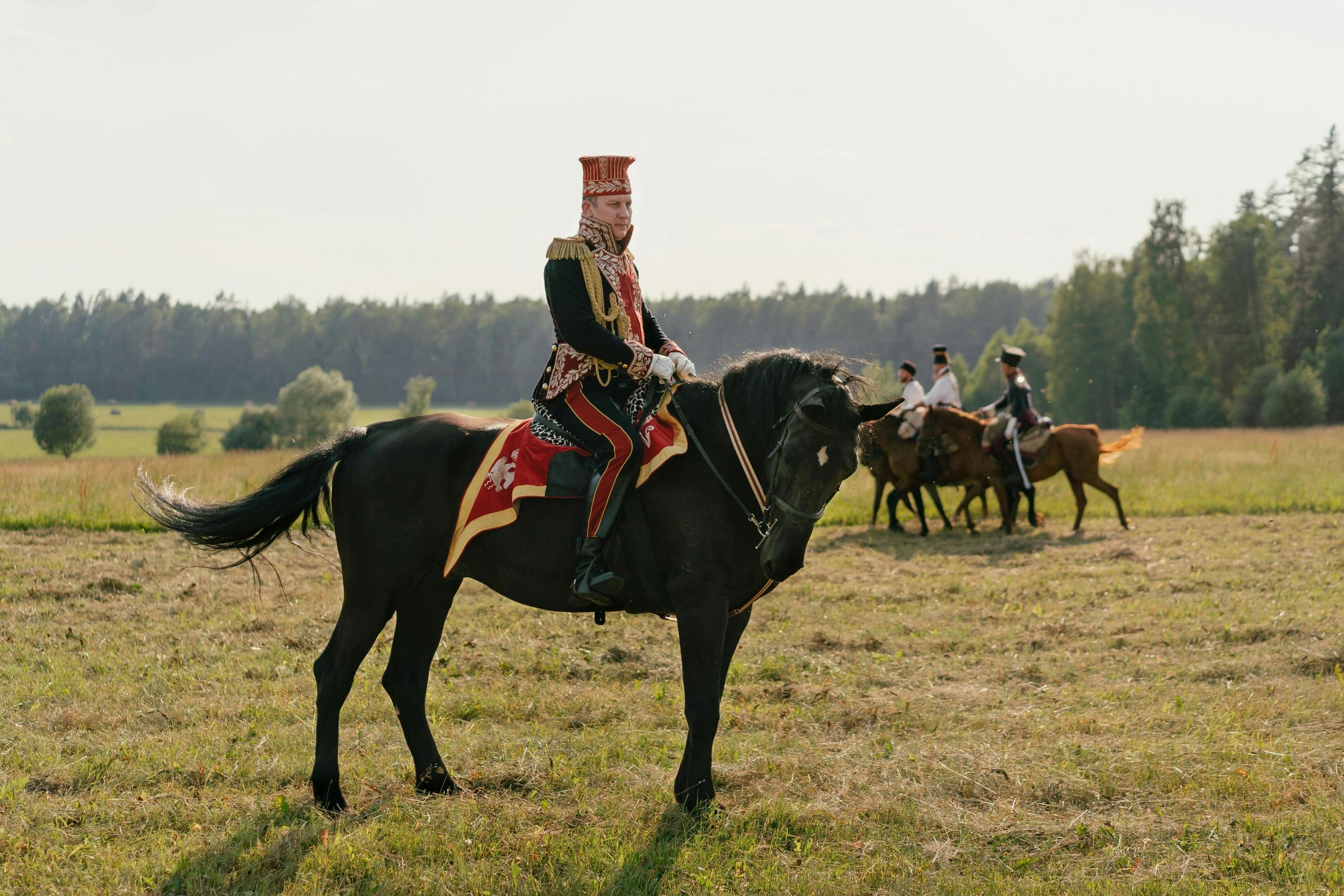 A cavalry unit standing proud after a victory on the battlefield