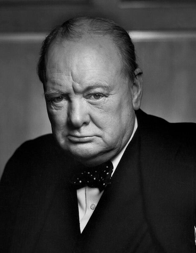 Winston Churchill dressed in a suit, ready to address the nation