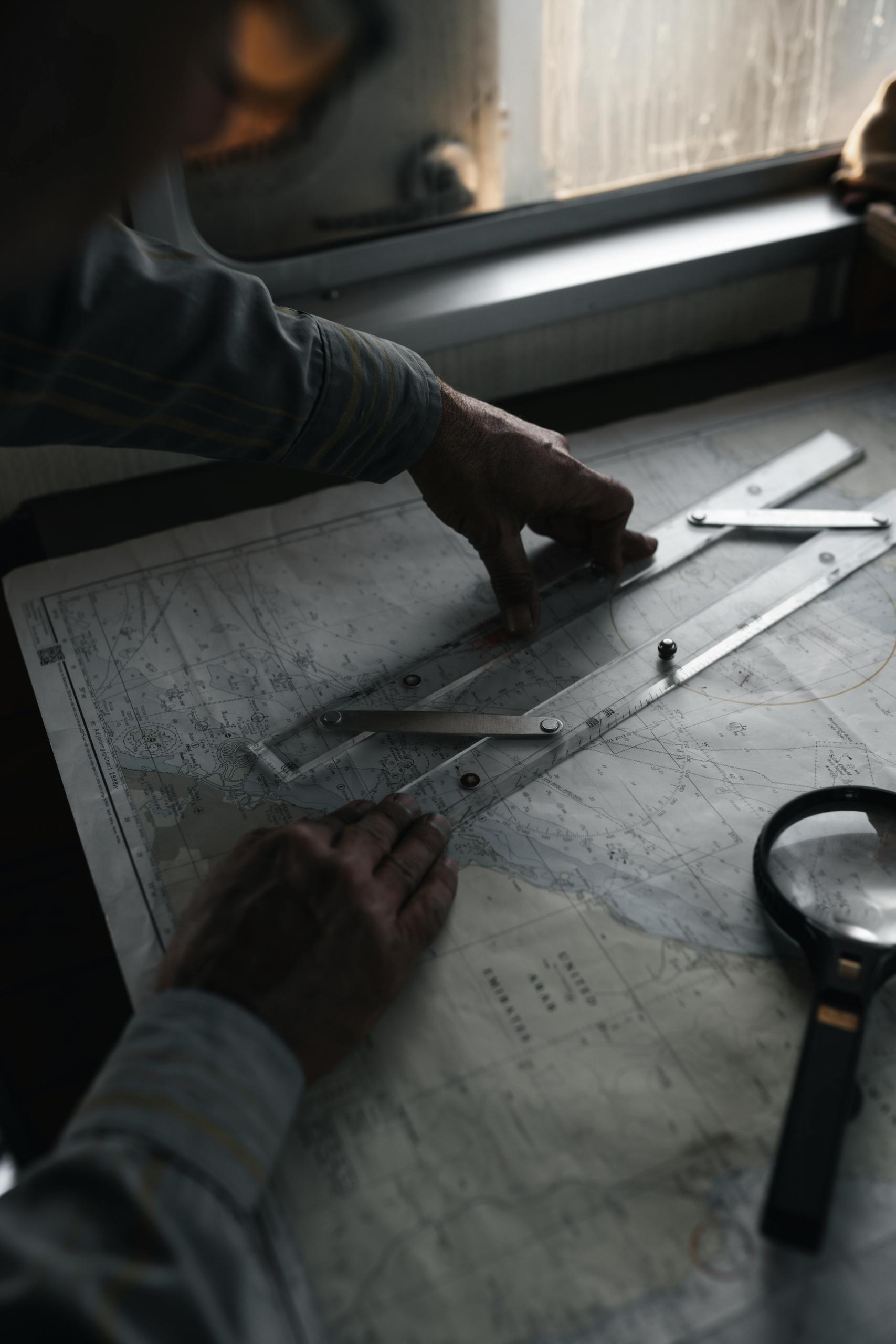 A ruler is used to draw the borders of a sketch map