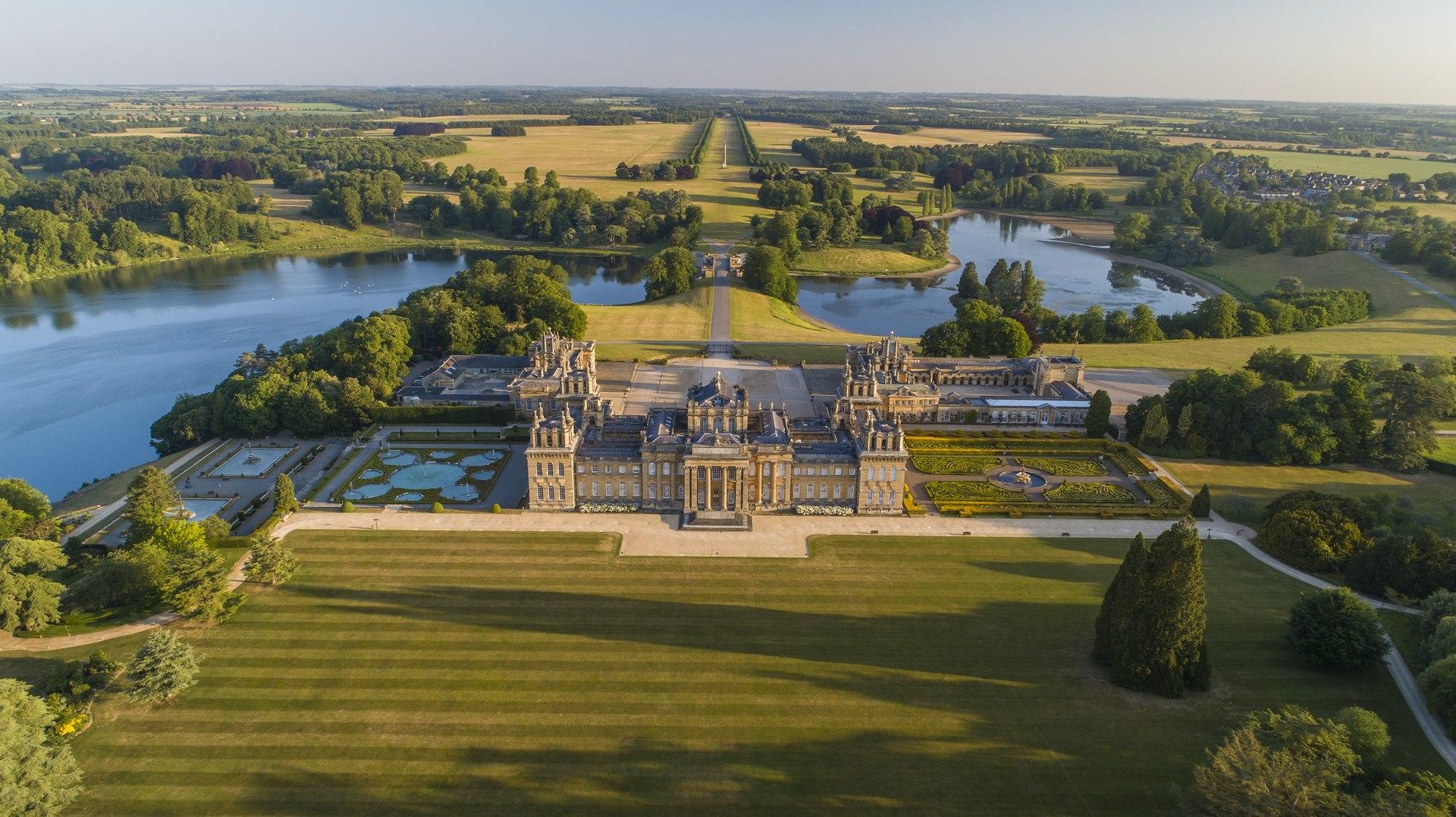 Blenheim Palace from above as well as its grounds and green spaces.