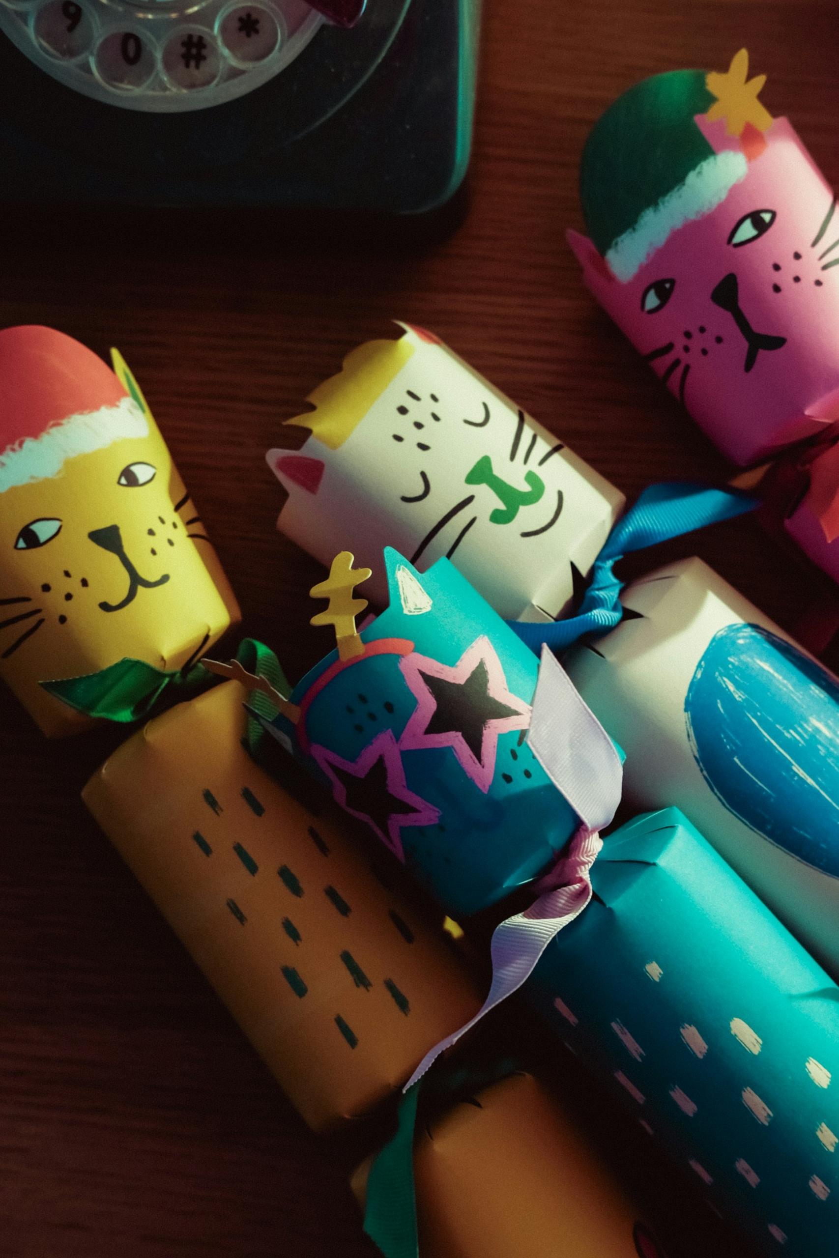 Christmas Crackers with a cat decoration.