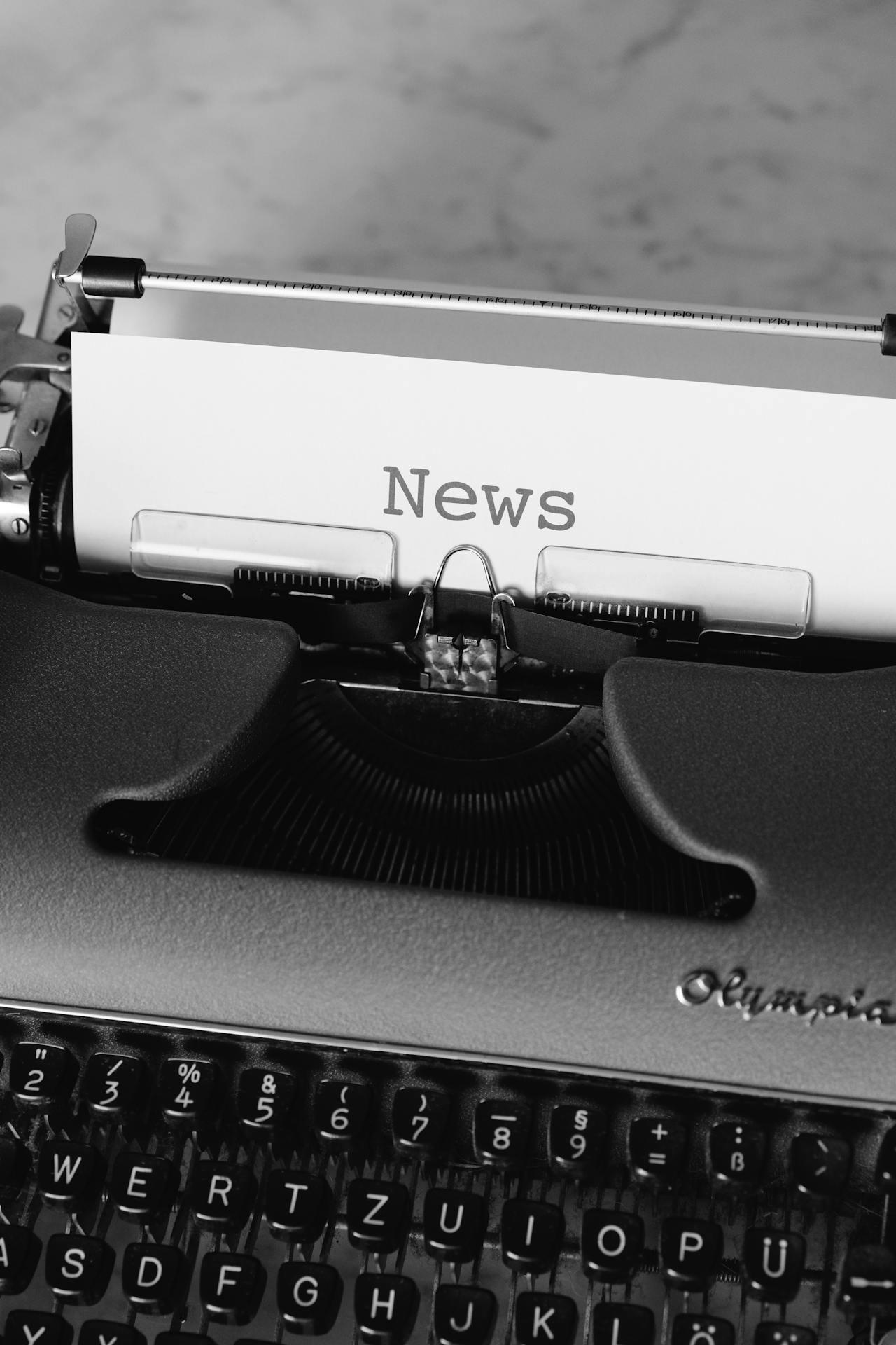 The word News typed out on a typewriter.