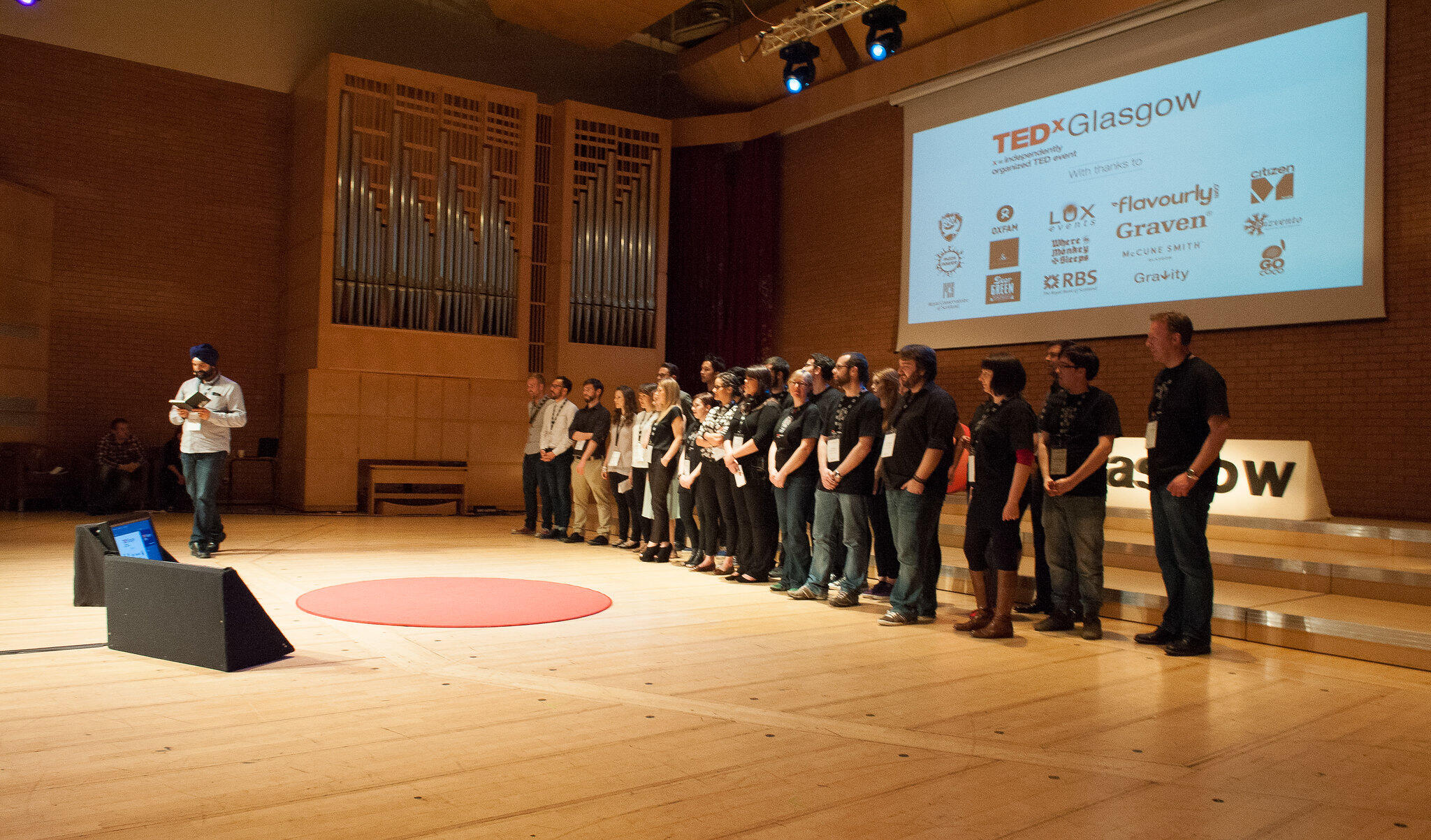A crowd on stage at the RCS for a TedX event