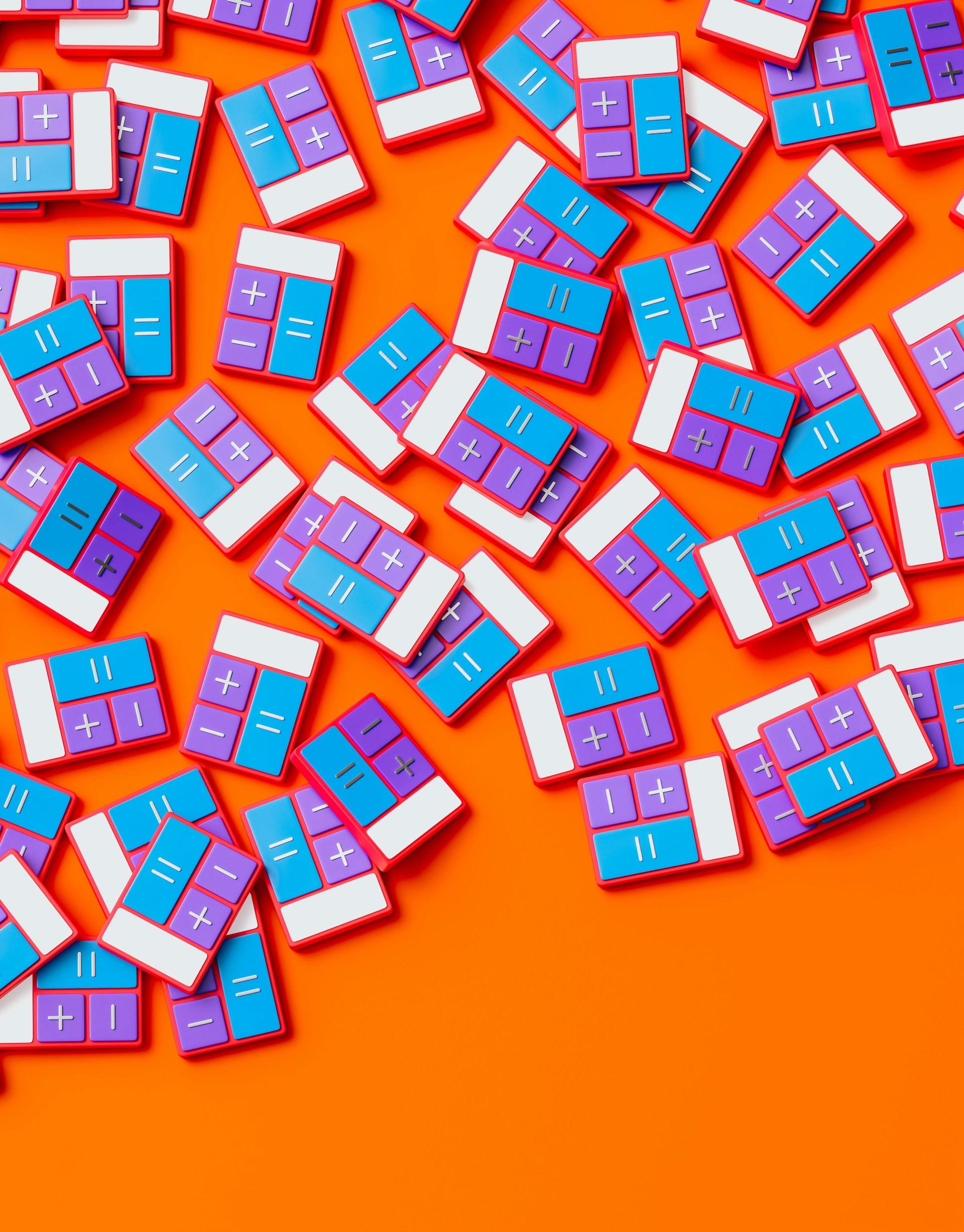 Blocks with maths symbols on them scattered on an orange background.