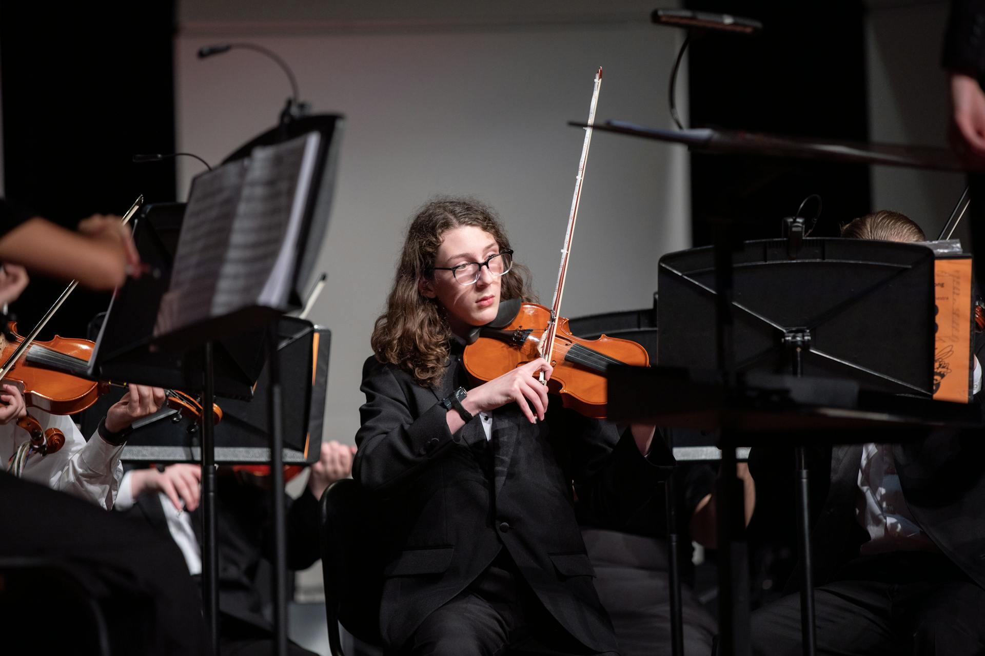 Violinists performing at a conservatoire