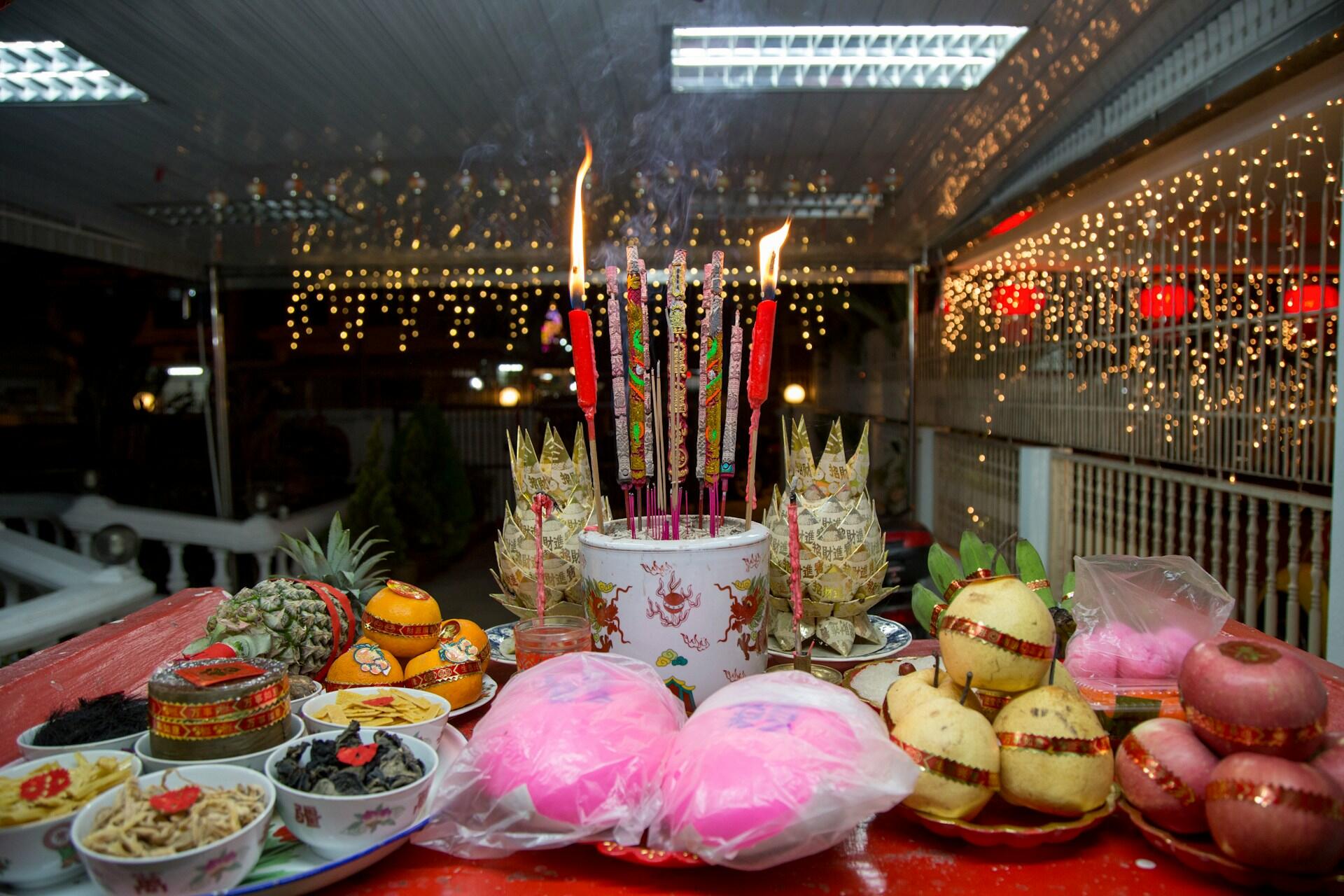 A table laden with fruits and food.