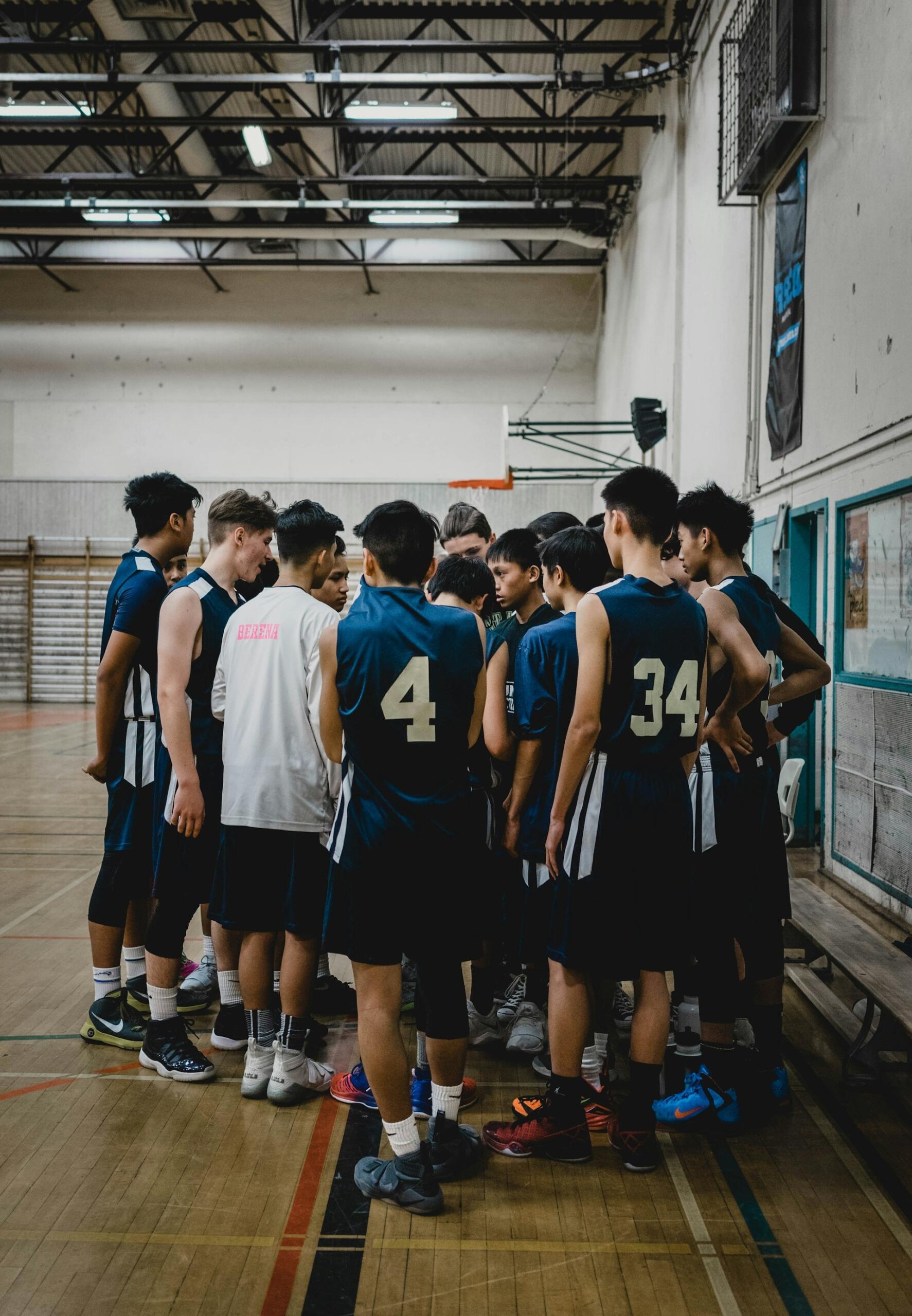 a group of students gathering before a basketball match