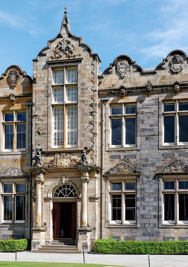 The hstoric University of St Andrews building with decorative stonework and large windows