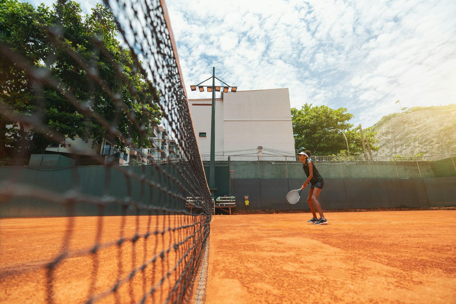 clay tennis court and net