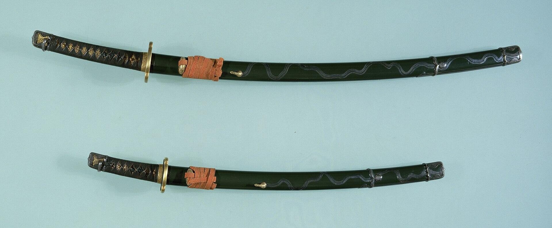 A long and short sword pair in matching sheaths.