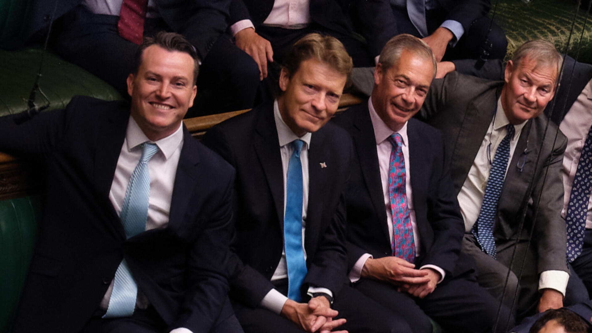 Nigel Farage with three other party members. 