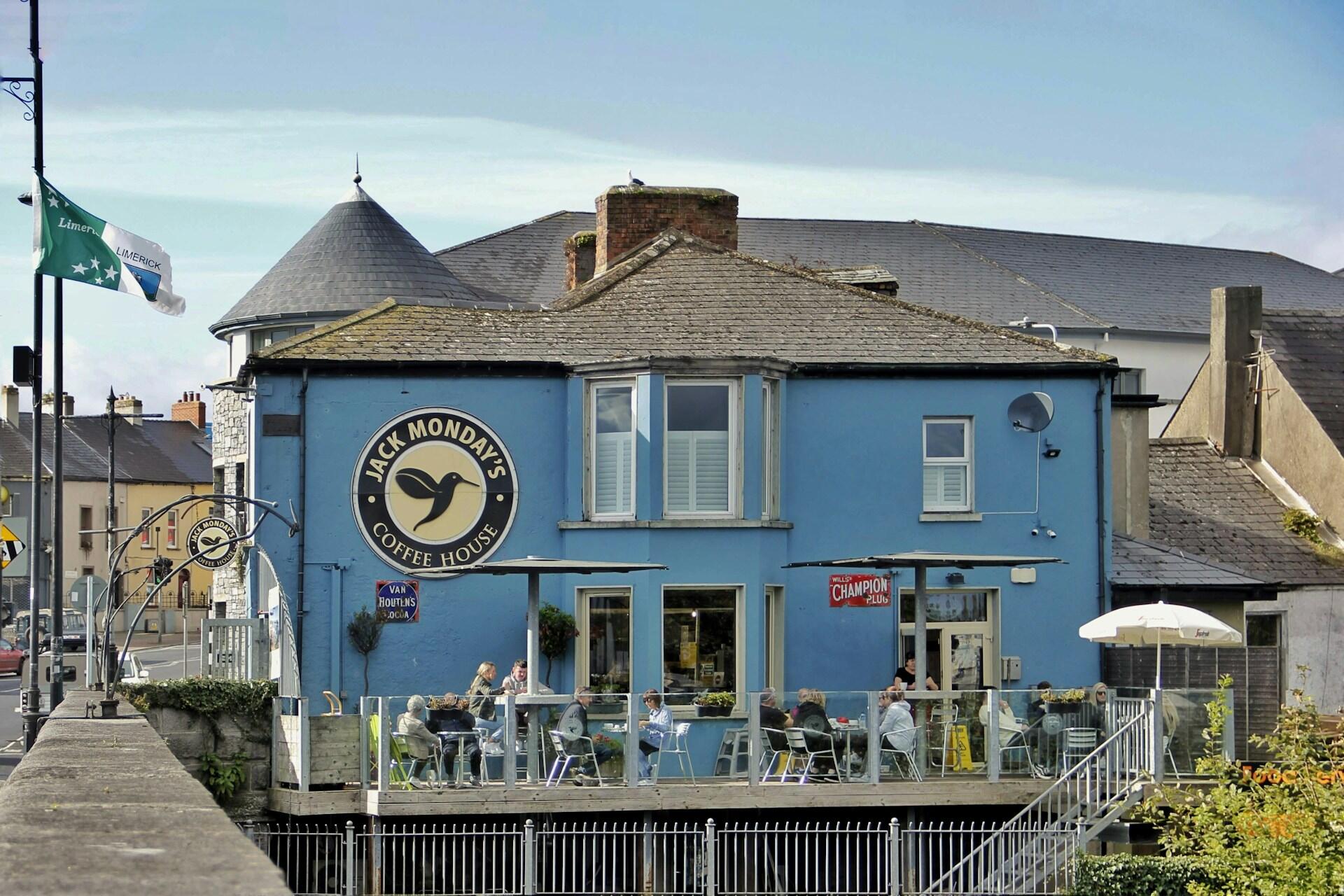 A blue building on a sunny day.