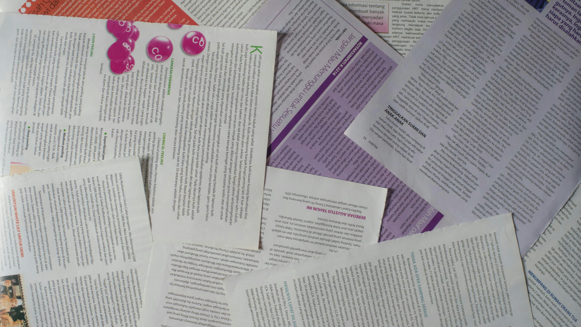 a variety of papers on a table