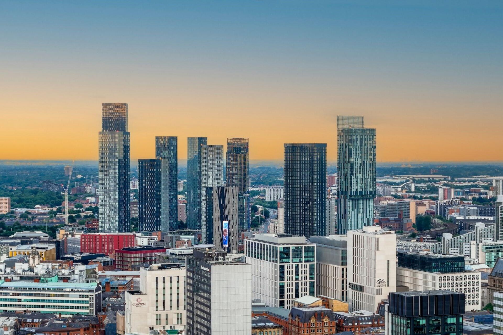 A view over the city of Manchester at sunset.