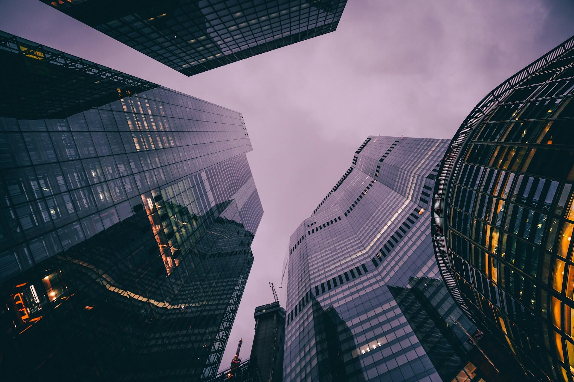 A view of skyscrapers in London from the ground.