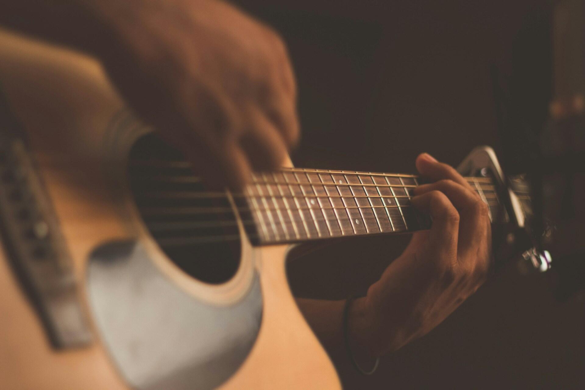 A closeup of an acoustic guitar.