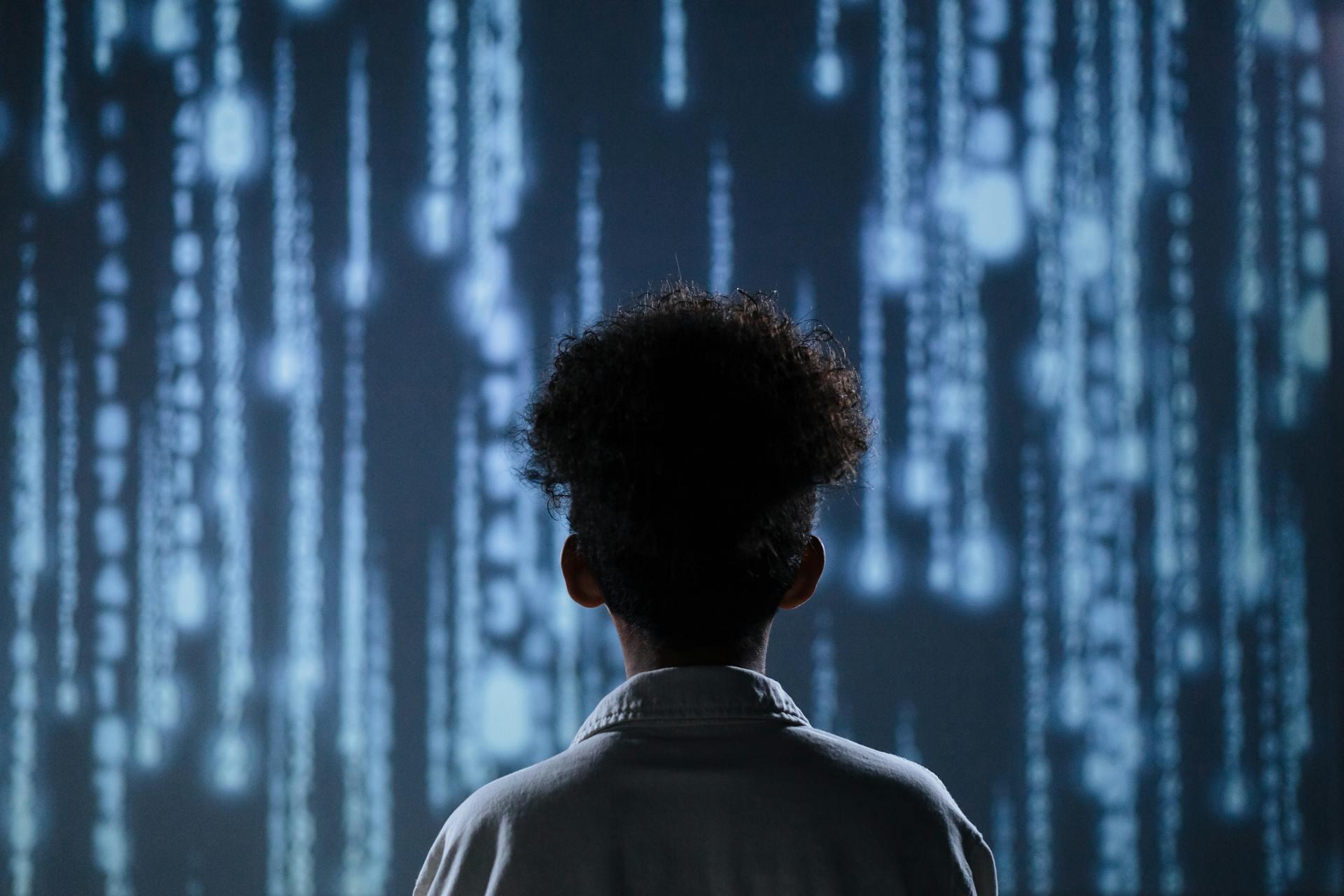 Child looking at digital display 