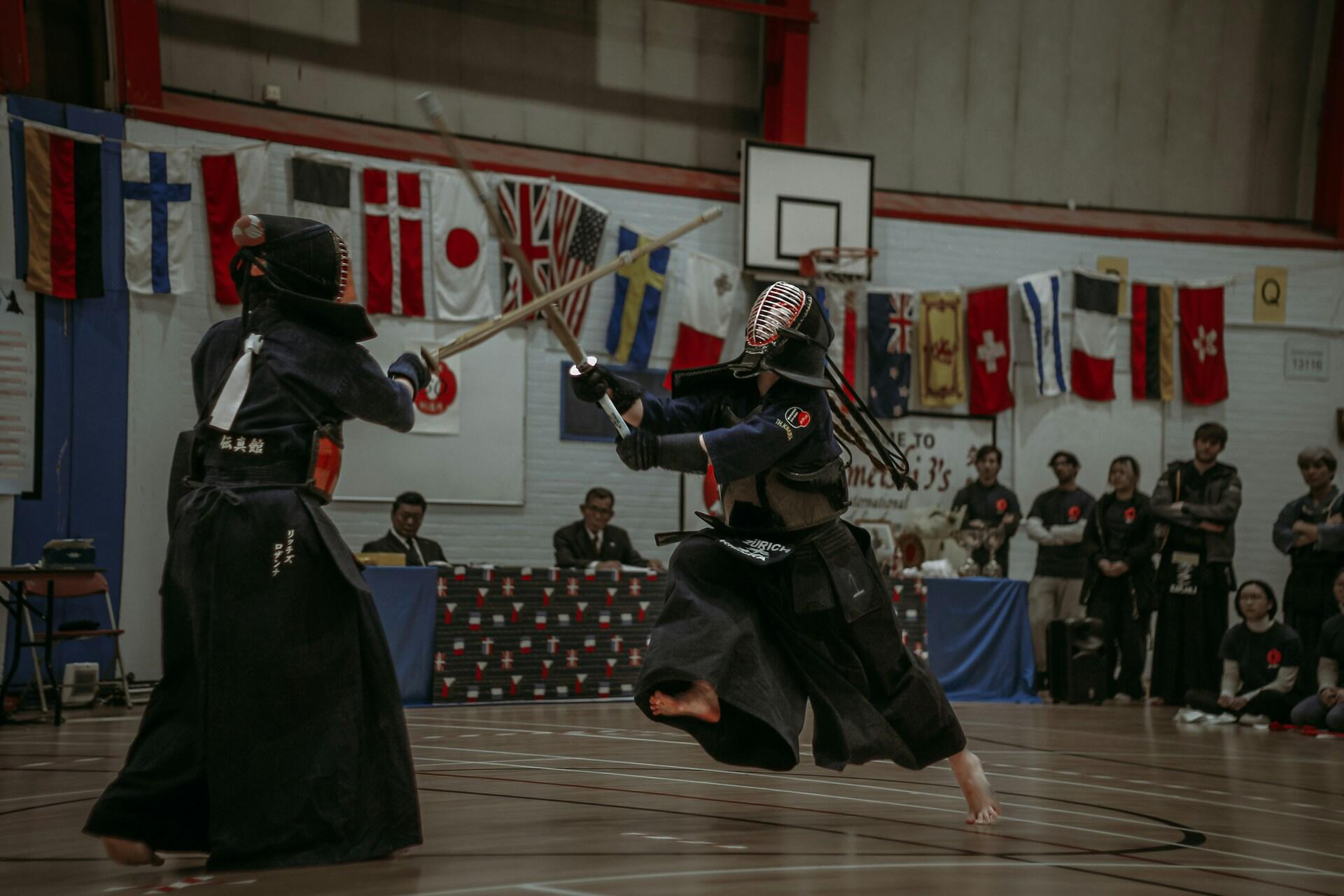 People practicing kendo.