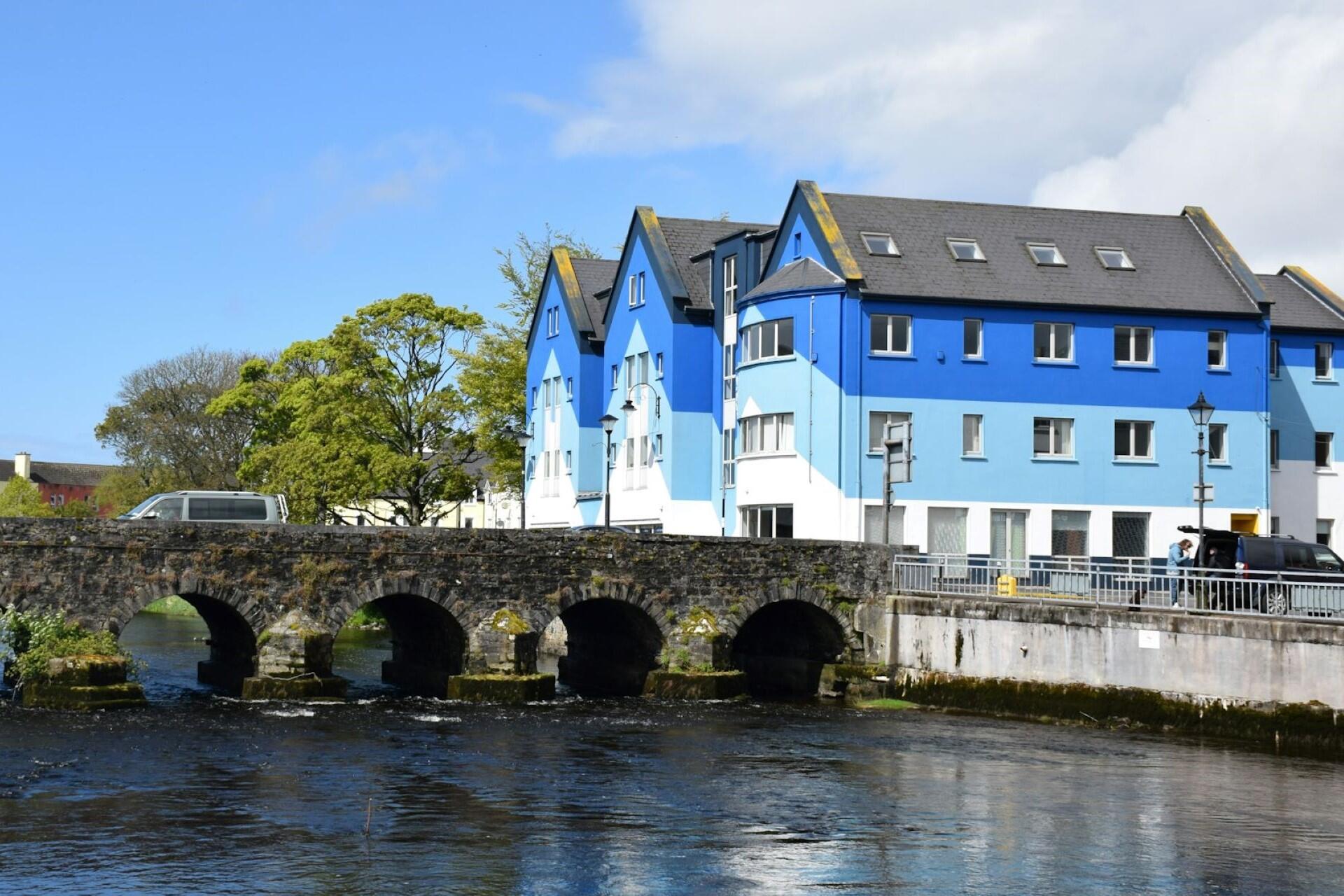 A view of a bridge and houses in Sligo, Ireland.