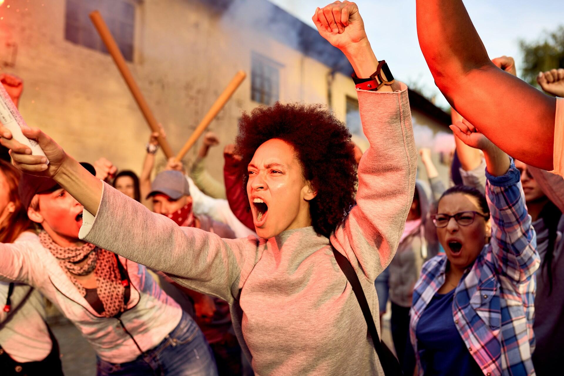 Women protesting in the street.