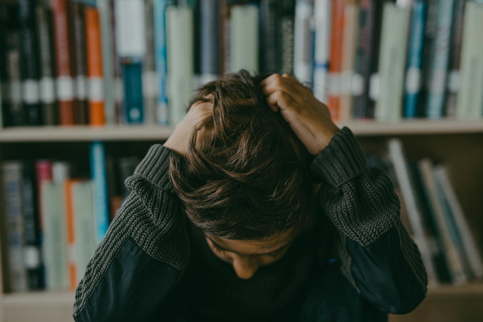 Student frustrated in library