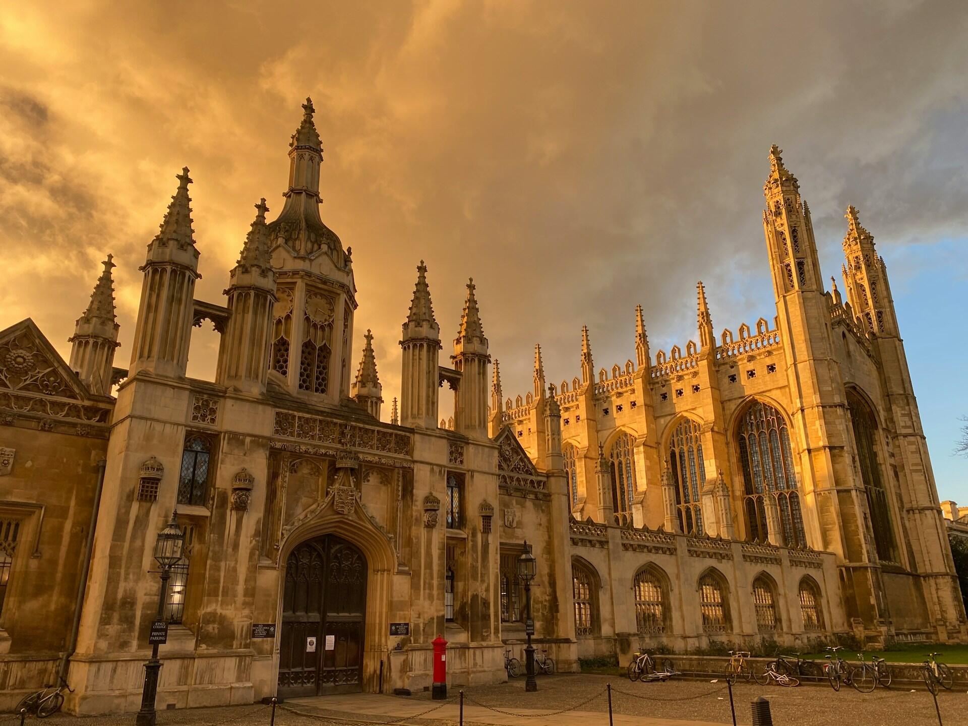 A large stone building at sunset.