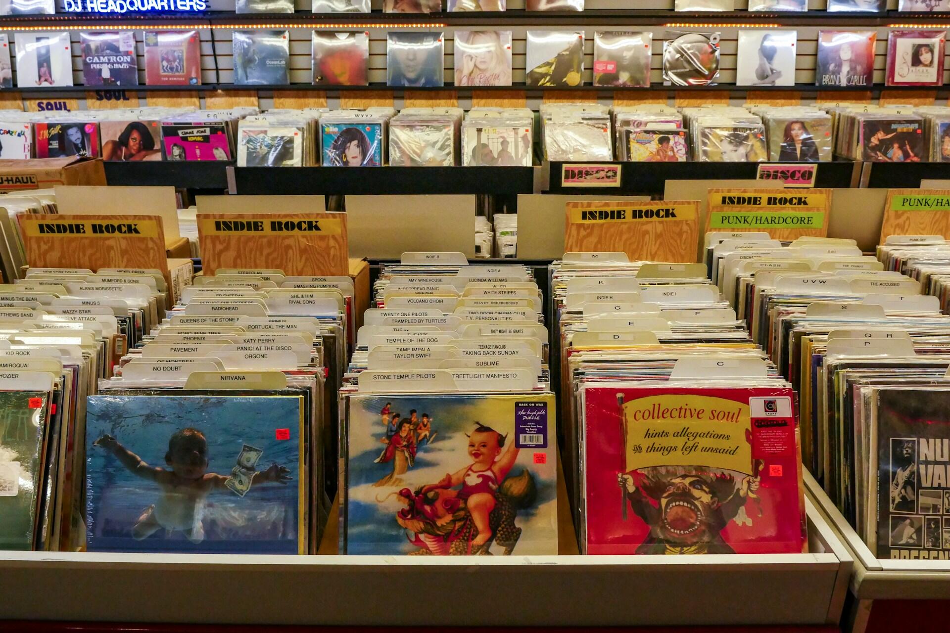 Several rock records in a store.