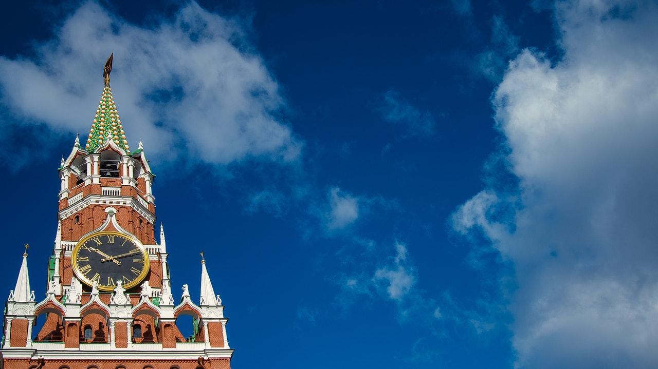 a building in Russia with unique architecture with a blue cloudy sky in the background