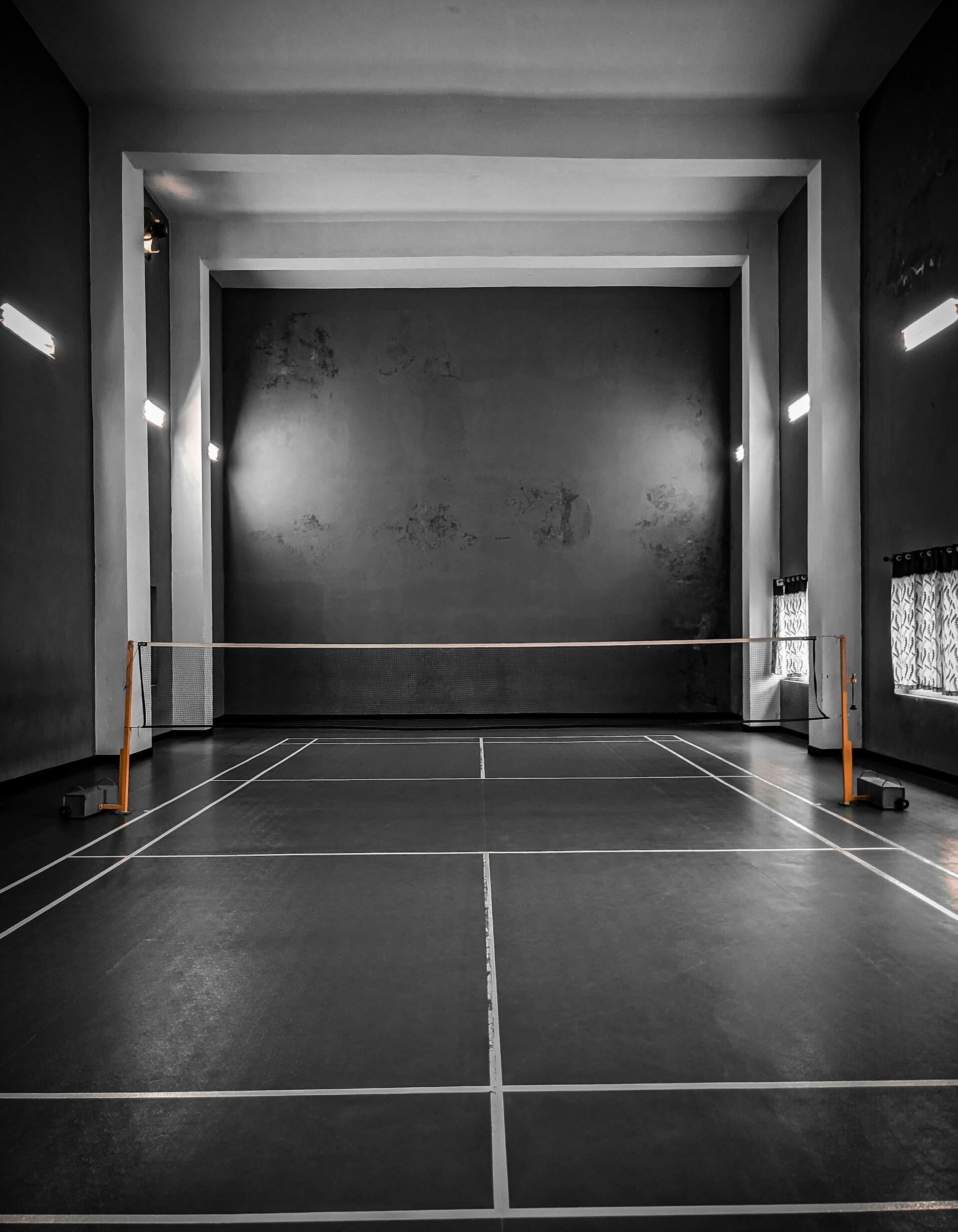 An empty indoor badminton court.