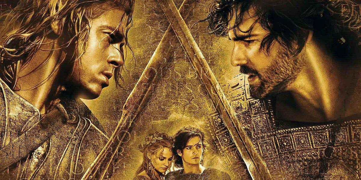 A dramatic poster featuring heroically posed characters against a gold-toned, textured background with ancient symbols and weaponry.