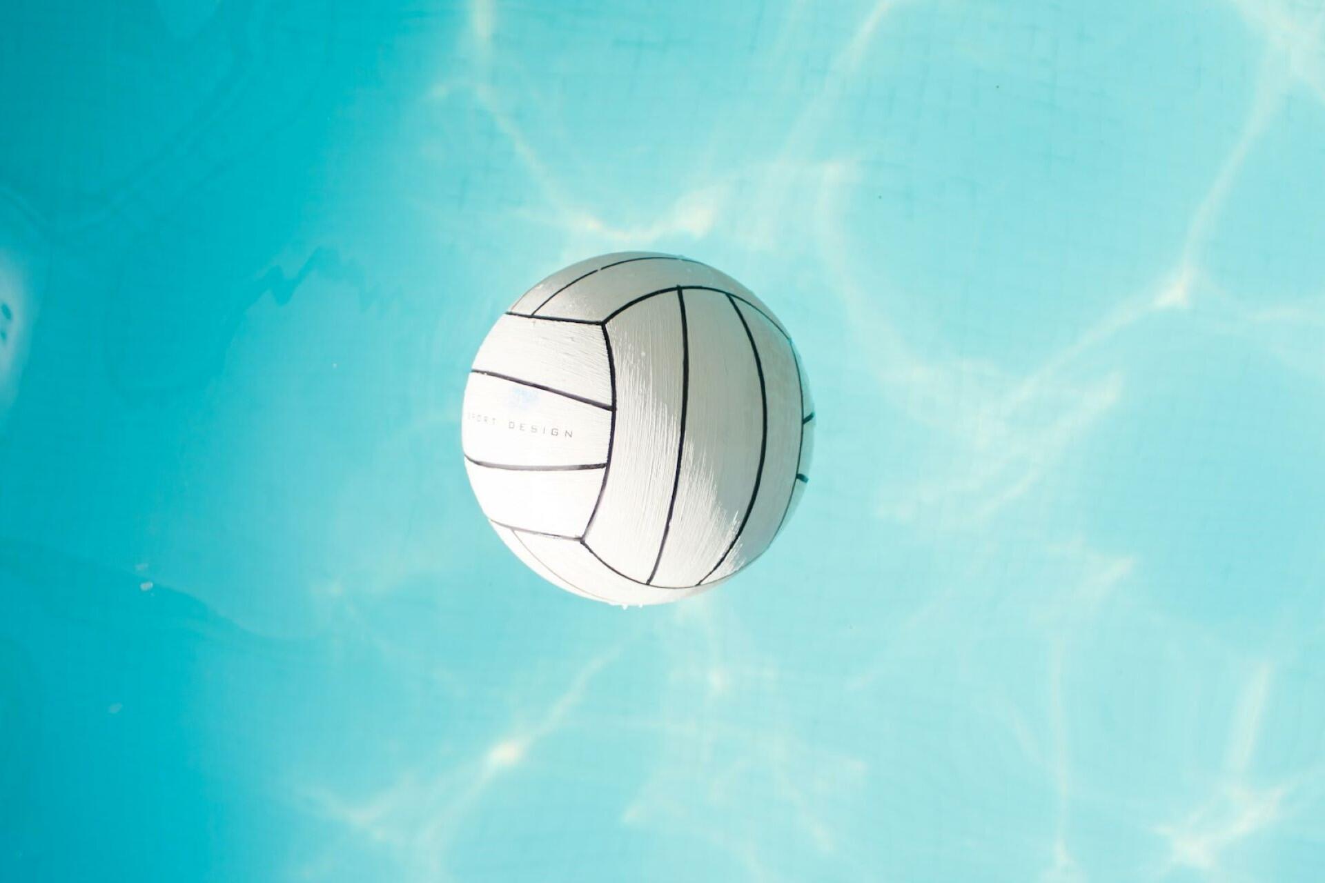 A volleyball in the air.