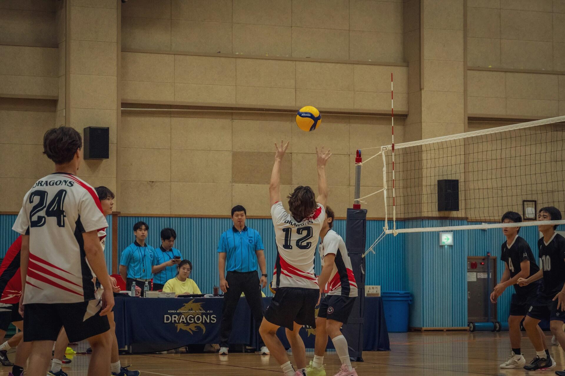 A volleyball player setting the ball.