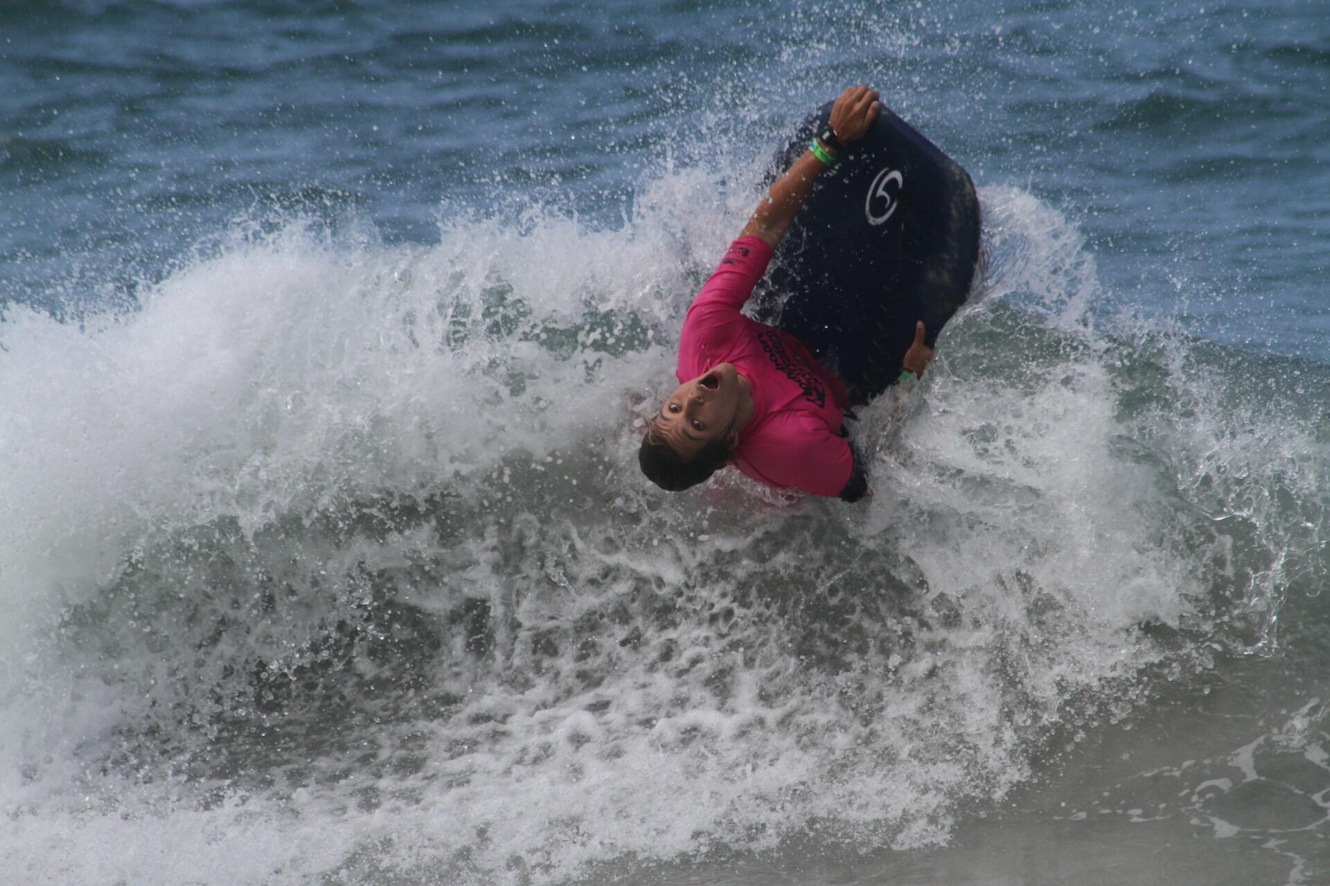 A person bodyboarding.