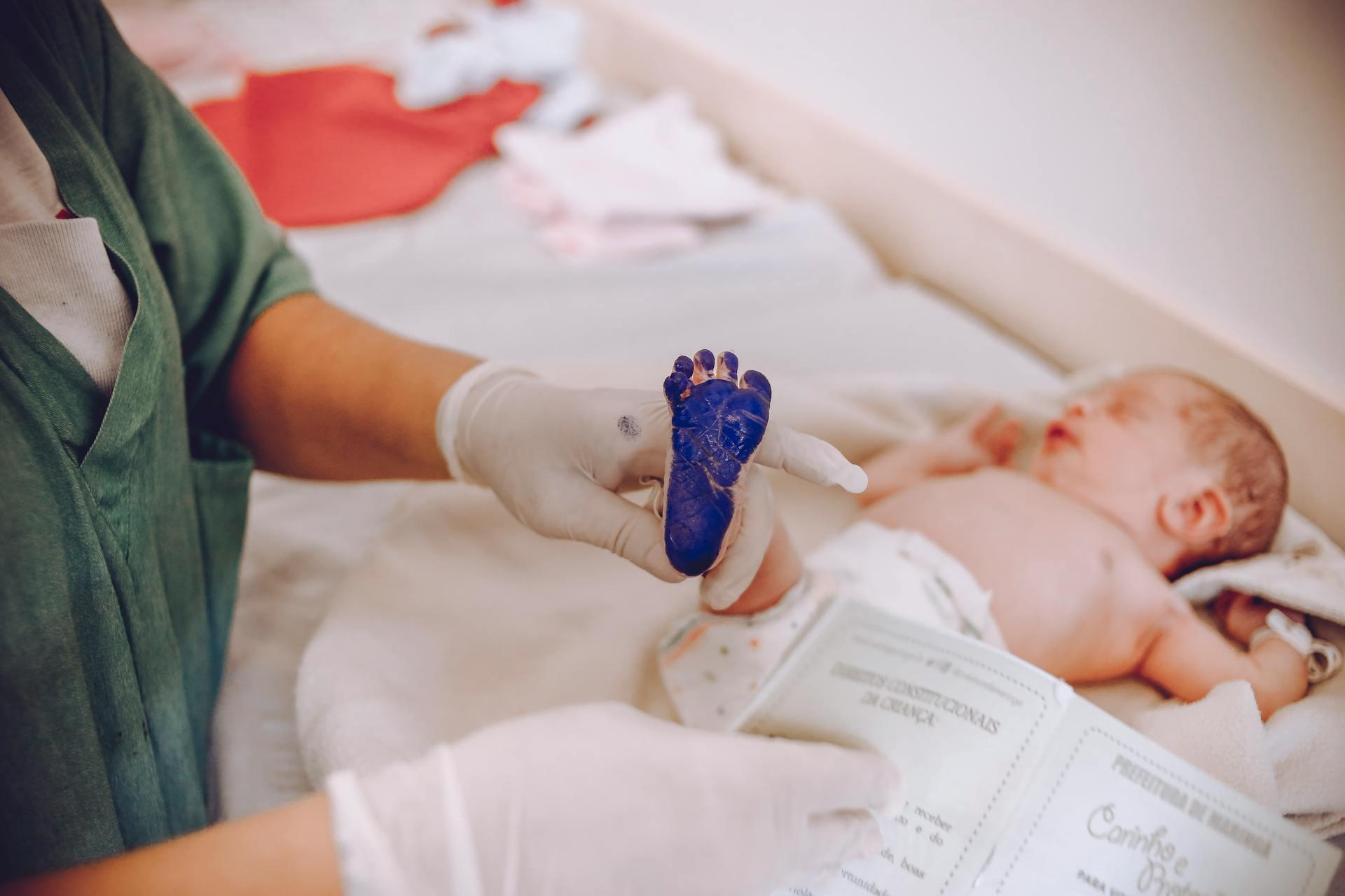 Baby with blue foot