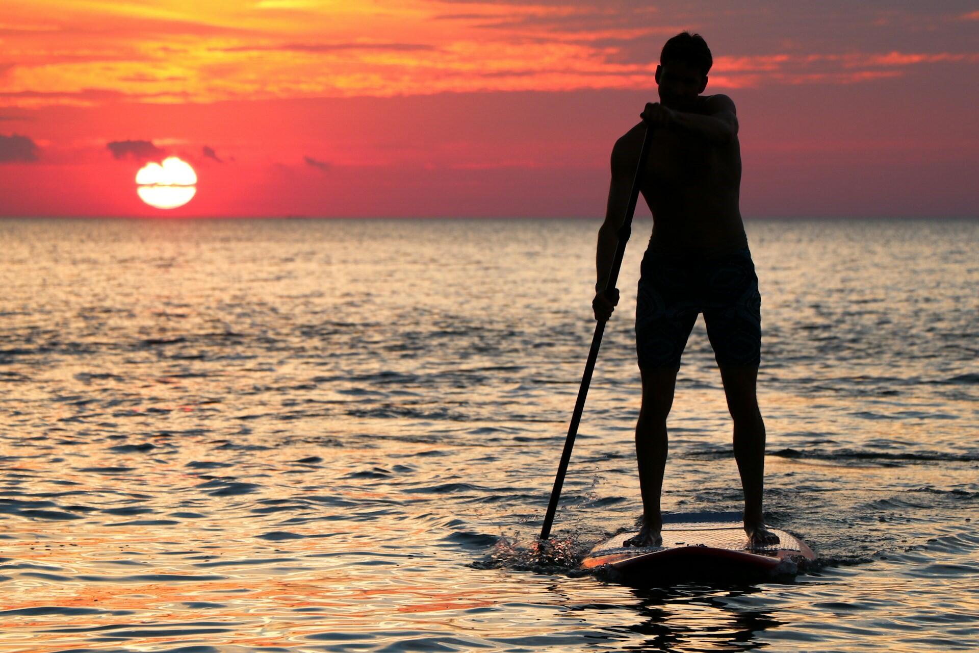 A person doing SUP.
