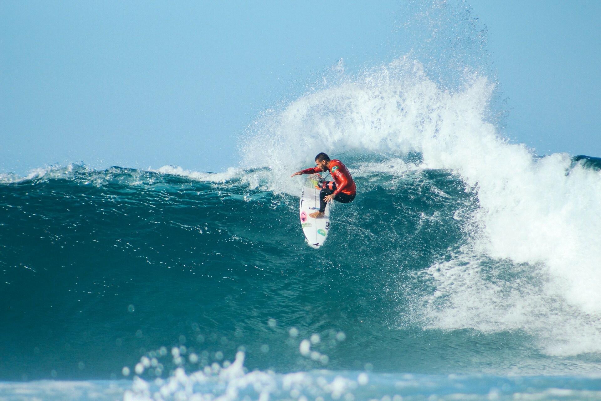 A surfer riding a wave.