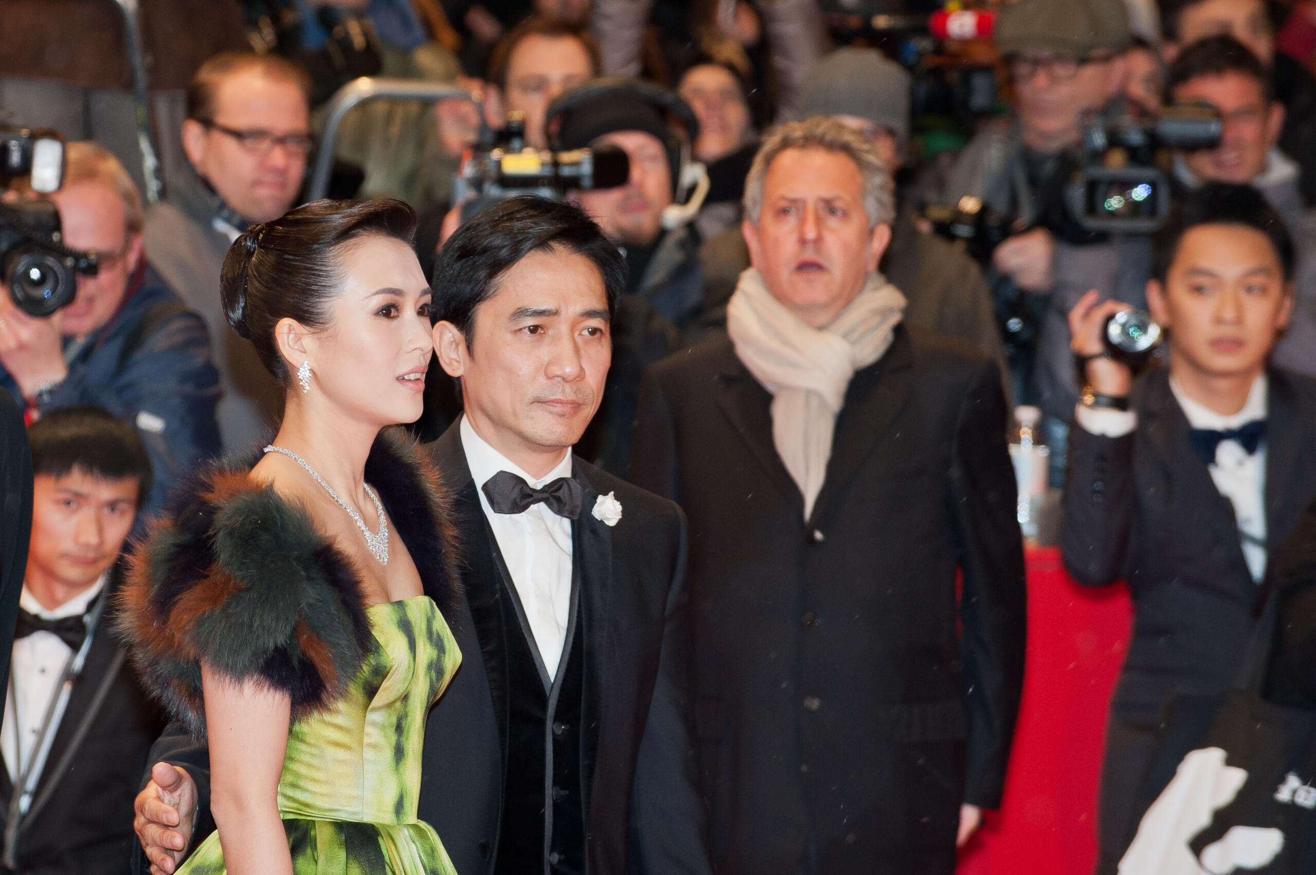 Tony Leung und Zhang Ziyi in the Berlin Film Festival 2013 posing for the cameras.