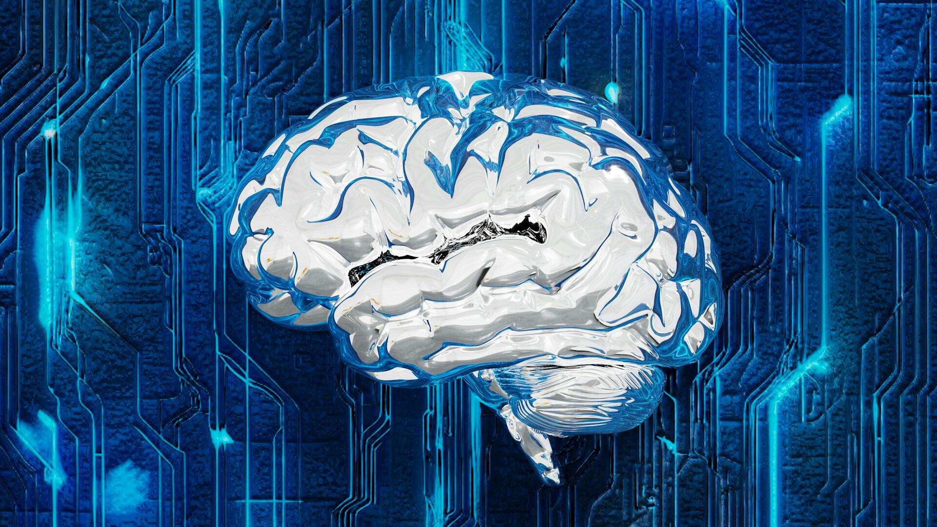 A shiny, digital brain rests on a blue circuit-patterned background, symbolizing the intersection of technology and intelligence.