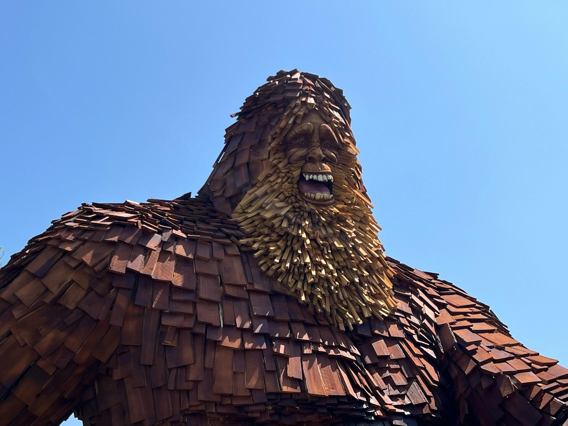 An imposing statue of a frightful snarling beast.